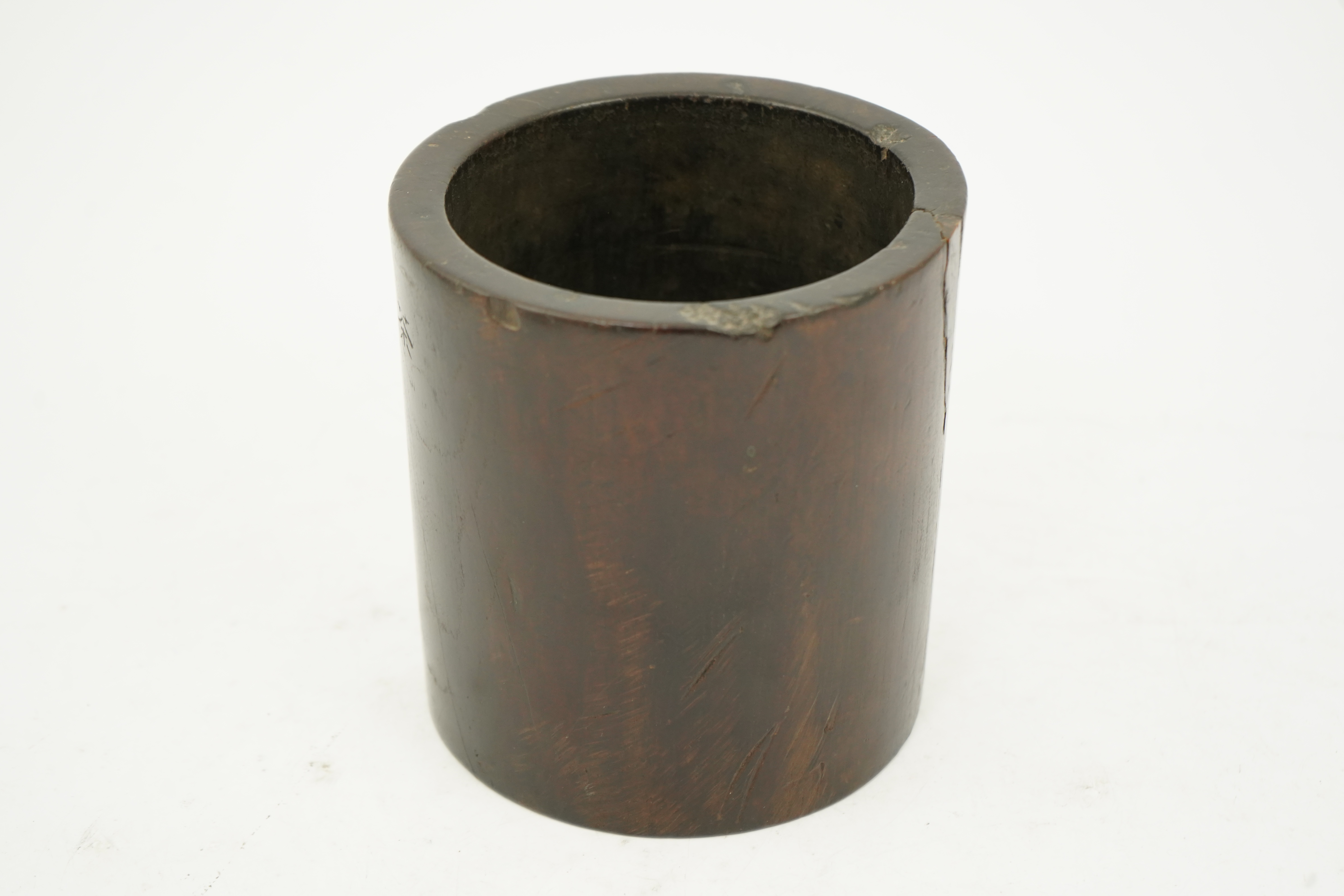 A Chinese inscribed hardwood brushpot, bitong, Qing dynasty